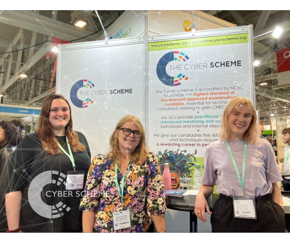 Staff members from The Cyber Scheme attending a conference