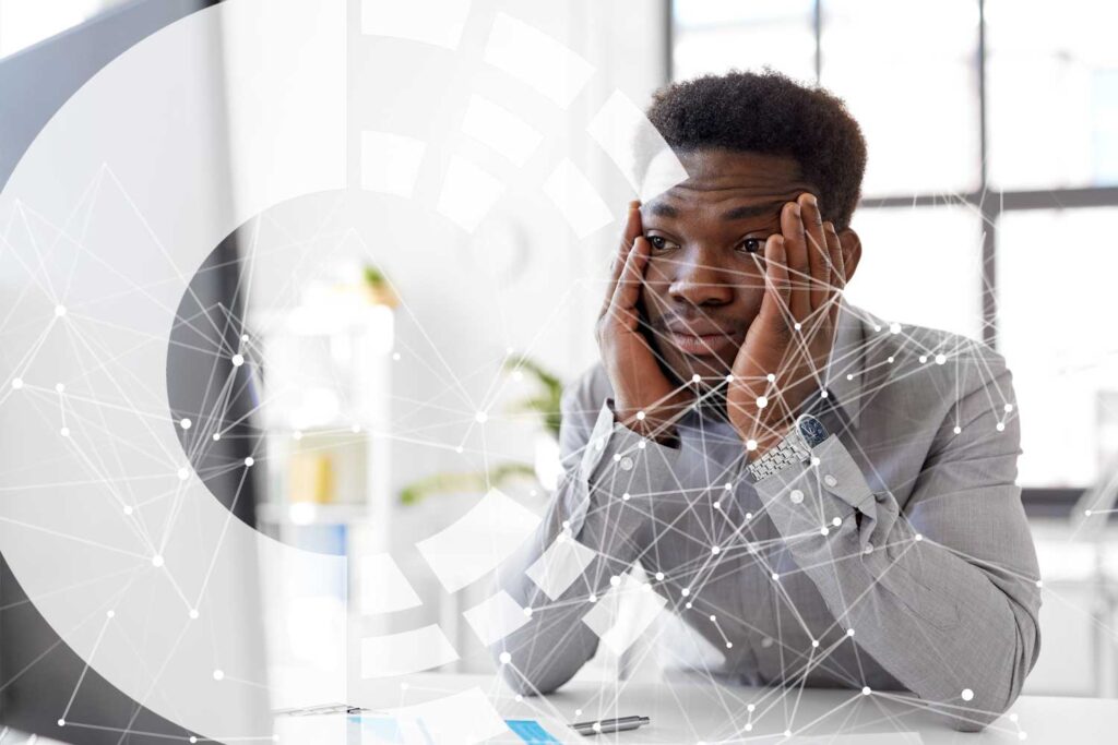 The Cyber Scheme brand image depicting a man struggling in an exam