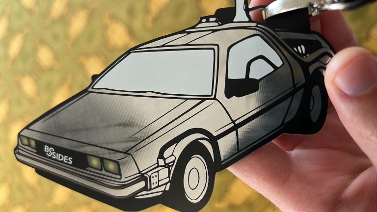 id badge shaped like delorian car